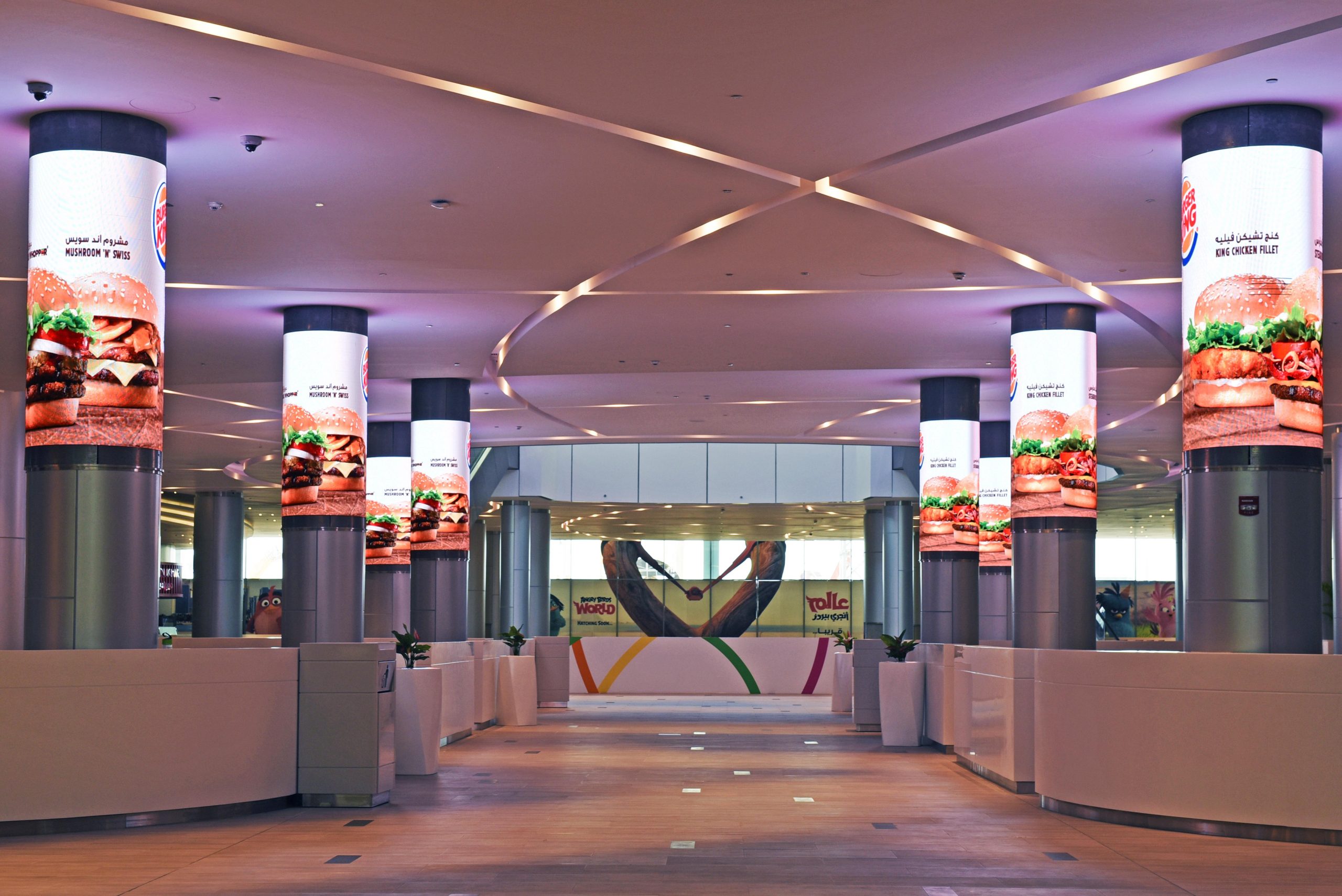 Multiple Digital Signages on the pillars advertising Burger King