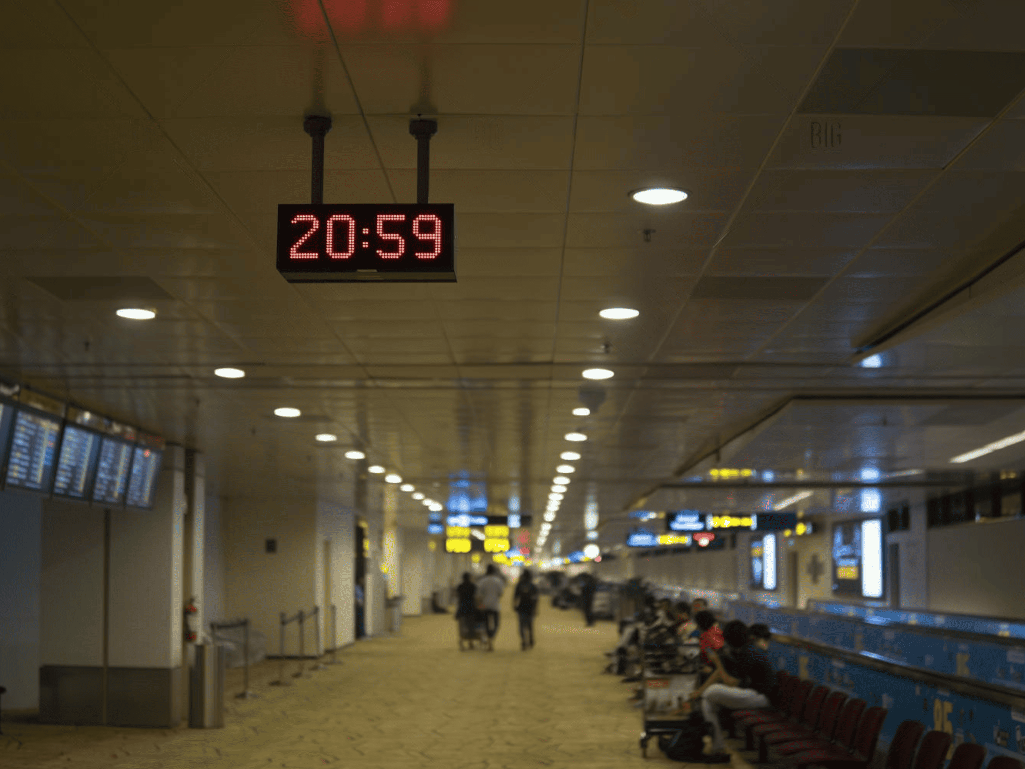LED Digital Clocks attached on the ceiling of the airport.