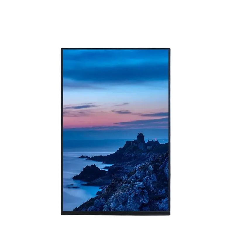 A digital signage screen displaying a picture of a majestic castle on a cliff overlooking a vast ocean at sunset.