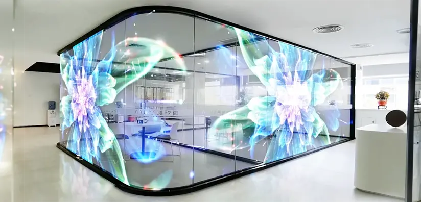 A Transparent LED Screen displaying vibrant flower graphics.